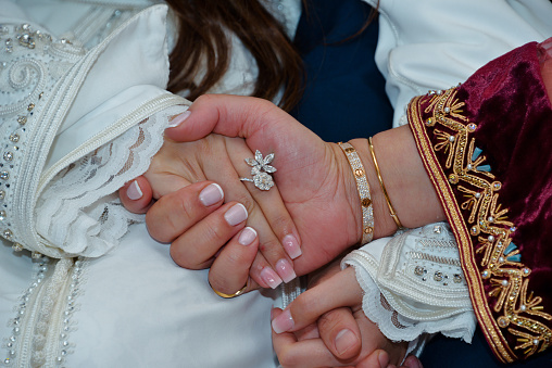 Close up of arabic couple's hands at a wedding