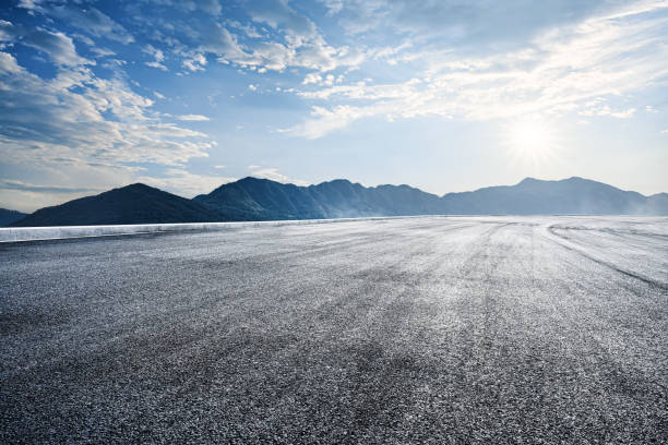 istock Empty asphalt road and mountains nature scenery at sunrise 1657059744