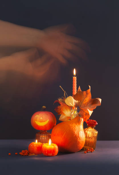 istock halloween decor with pumpkins on dark blue background 1657100916