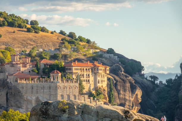 istock Greek Rock Monastery and Tourists 1657109386