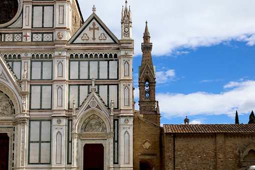 Partial view of the facade of the famous Basilica di Santa Croce in Florence, Italy