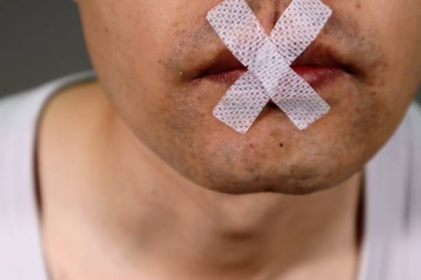 istock Image of a person who is silenced 1657147736