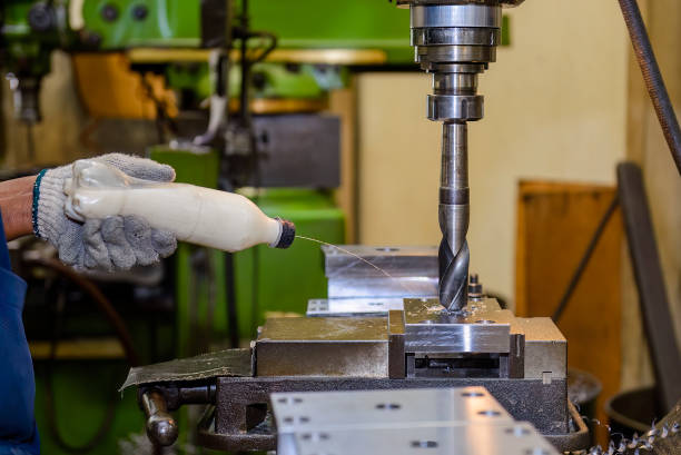 istock The drilling process on NC milling machine with liquid lubricant. 1657161664