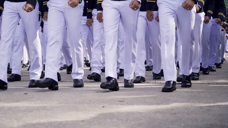 Close up  young soldier roll orderly marching in formal suit go to celebrate in Army  day.