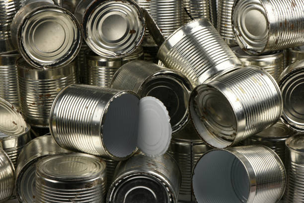 istock Open old metal tin cans background. 1657181190