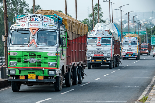 Daund, India - September 03 2023: Trucks on the move on the Daund to Ahmednagar highway, SH10 at Daund India.