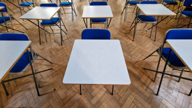 istock Close up of school exam desks 1657250297