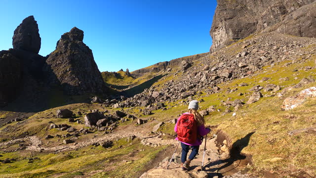Video of a couple hiking to see the Old man of Storr.
