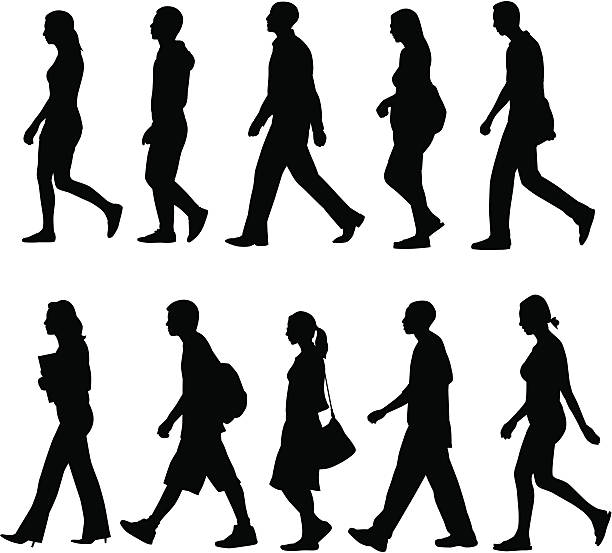 Silhouettes of people walking.