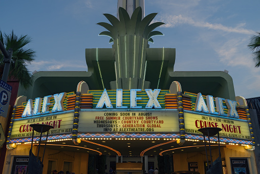 Glendale, California, United States: Alex Theater facade show at dusk during Cruise Night in the City of Glendale. The Alex Theater, originally Alexander Theater, officially opened its doors on September 4, 1925.