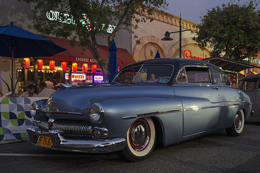 Glendale, California, United States: 1950 Mercury 2-Door Sedan car shown parked at dusk during Cruise Night.