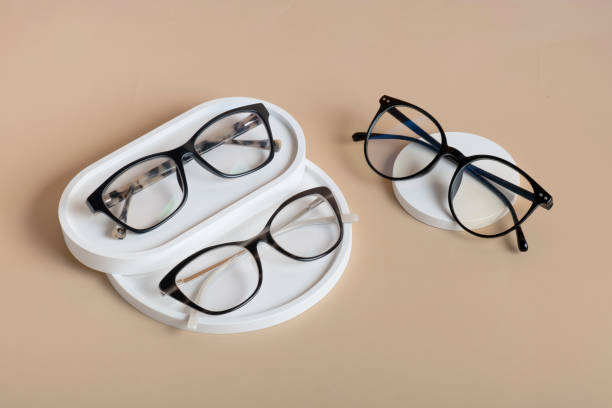 istock Gypsum elements with eyeglasses on beige background. Optical store, vision test, stylish glasses concept top view, flat lay 1657362770
