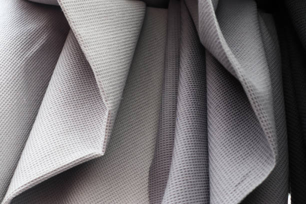istock Close up view on samples of cloth and fabrics in different colors. 1657374480