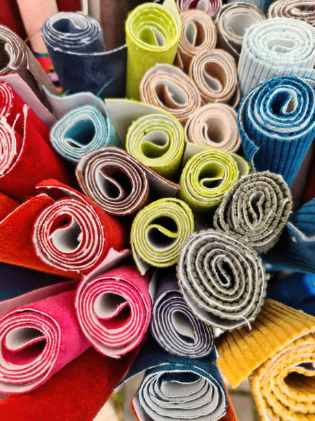 istock Close up view on samples of cloth and fabrics in different colors. 1657375133
