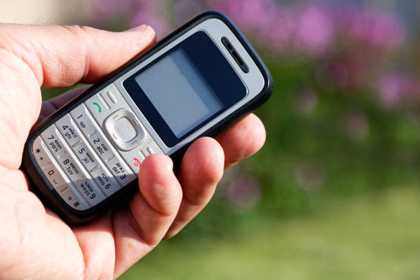 Old push-button cell phone stock photo