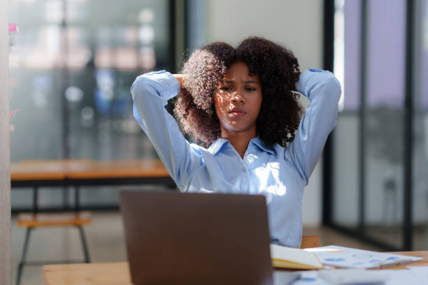 istock Young business woman worried about problem at work and stressed about problem with laptop computer. 1657382249
