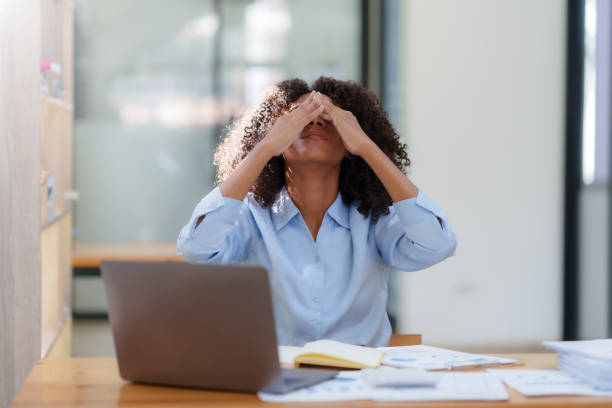 istock Businesswoman stressed with overwork in the office. 1657382692