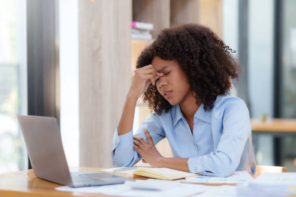 istock Businesswoman stressed with overwork in the office. 1657382702