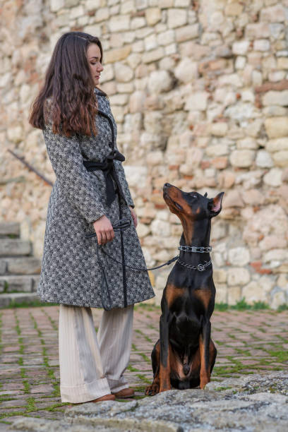 istock Girl with dog 1657400014