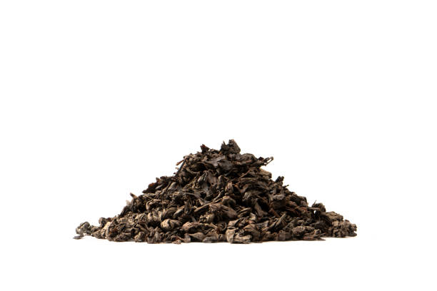 istock Dried tea leaves isolated on a white background. 1657402328
