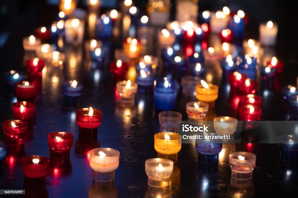 Colorful candles in the dark group of commemorative candles Backgrounds Stock Photo