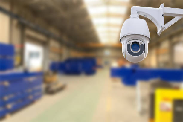 istock CCTV Camera or surveillance operating inside industrial factory. Copy space. 1657414623