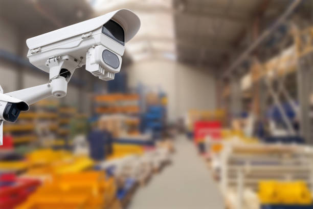 istock CCTV Camera or surveillance operating inside industrial factory. Copy space. 1657417365