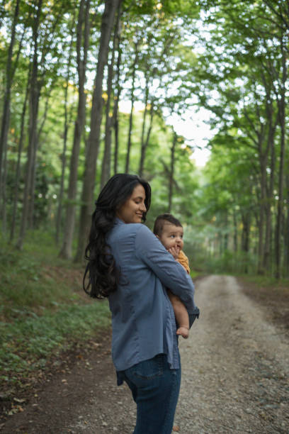 istock Mother and son enjoying a walk in the woods 1657442031