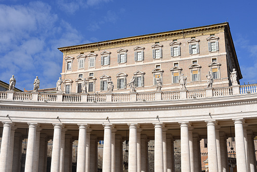 Rome, Italy - 27 Nov, 2022: Balconies of the papal apartments in St Peters Square, Vatican City