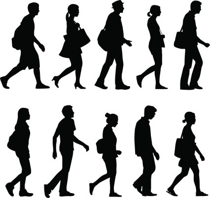 Silhouettes of guys and girls walking