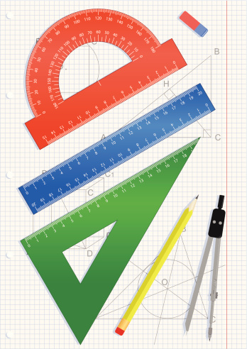 Set of geometric tool on sheet of paper.