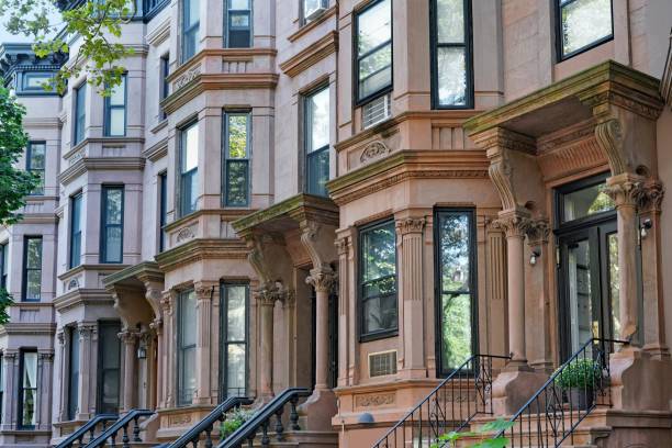New York, row of brownstone apartment buildings with bay windows stock photo