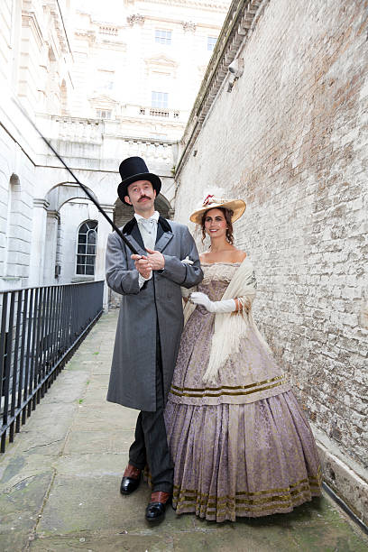 Costume Themed Victorian Couple Out For A Stroll