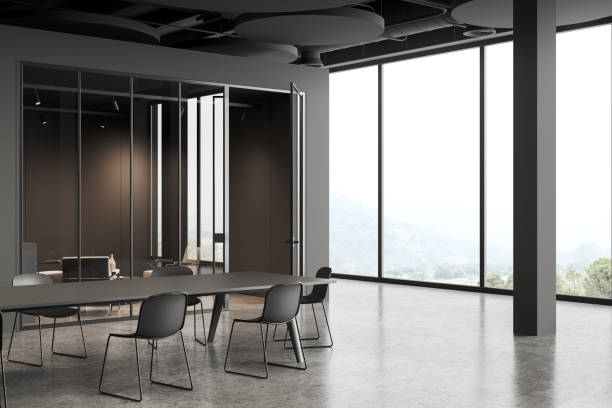 istock Grey business room interior with meeting board, relax place and panoramic window 1657558137