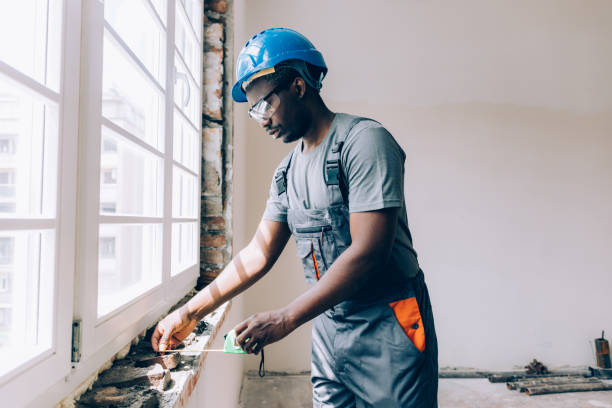 istock African American Worker Replacing the Windows in an Apartment 1657566613