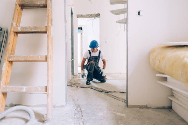 istock Caucasian Construction Worker Installing Pipes in an Apartment 1657567148