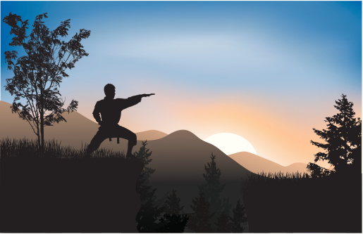 Silhouette karate who found peace in nature