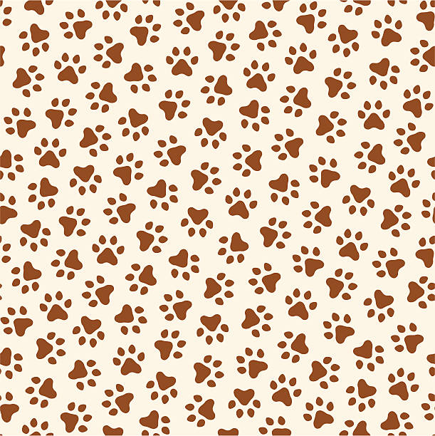 Creme and brown seamless paw print pattern vector art illustration