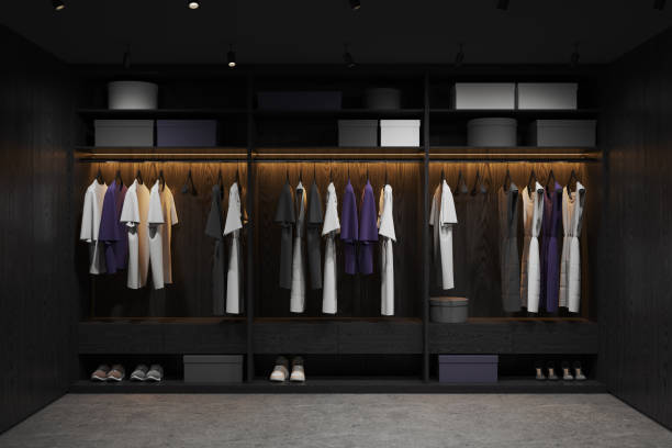 istock Dark wooden walk in closet interior with wardrobe 1657641086