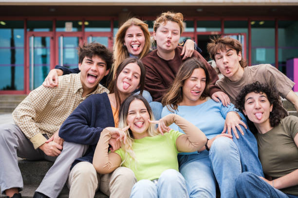 istock Group of students together resting from hours of study and with funny faces having a good time. Concept: fun, studies, education 1657643789