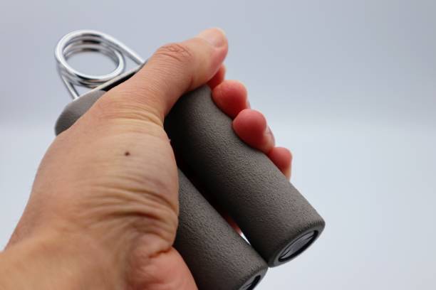 istock A person who trains his grip strength with a hand grip 1657646025