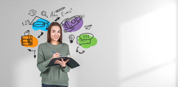 istock Smiling woman with notebook in hands, education sketch on copy space background 1657664192