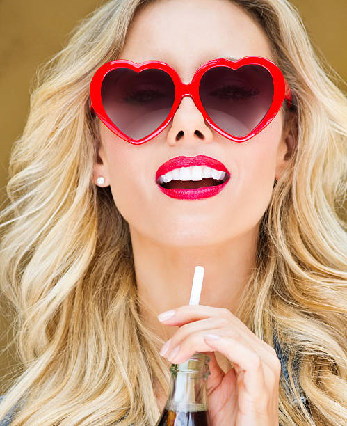 istock Trendy Woman Having A Soft Drink 165767328