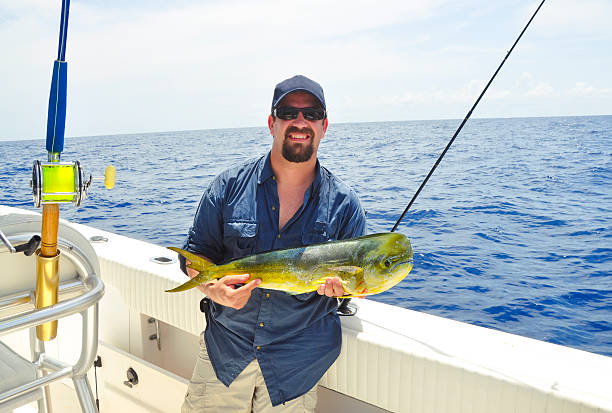 Angler showing off his catch stock photo