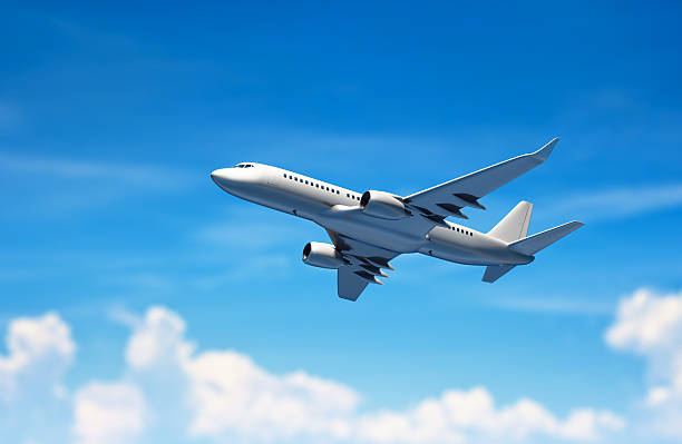 Airplane flying above clouds. Passanger airplane flying above clouds. 737 stock pictures, royalty-free photos & images