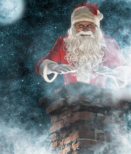istock Santa looks at chimney 165771310