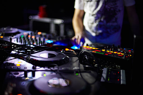 istock Closeup of a DJ's turntable and soundboard 165771482