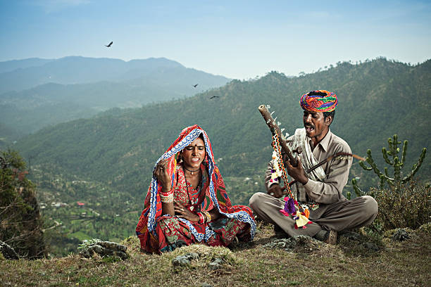 Real people from rural India: Folk singers of Rajasthan Real people from rural India: Folk singers of Rajasthan. The Aravalli hills break the monotony of desert and add diversity to the landscape of Rajasthan. indian music stock pictures, royalty-free photos & images