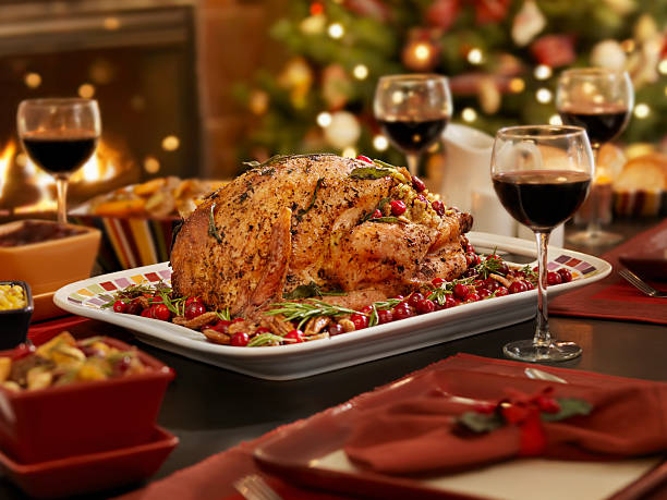 Christmas Turkey Dinner Christmas Turkey Dinner, with a Cranberry, Sage Dressing, Candied Pecans with Cranberrys and Rosemary  -Photographed on Hasselblad H3D2-39mb Camera roast turkey stock pictures, royalty-free photos & images