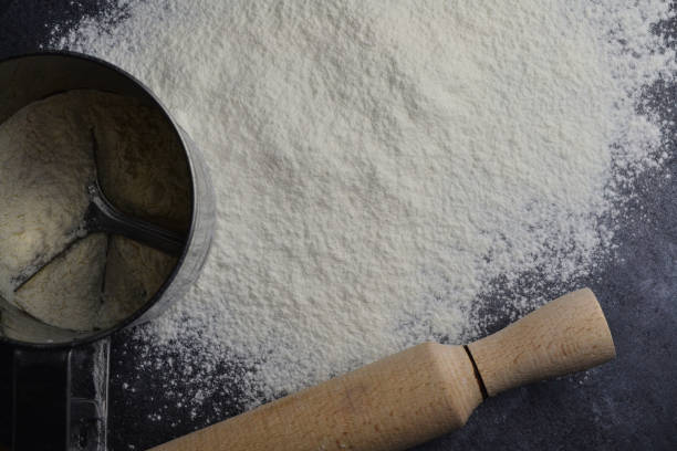 istock sifted flour on a black table 1657754622